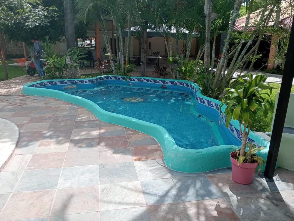 Quinta Jardín Secreto · alberca y jardín